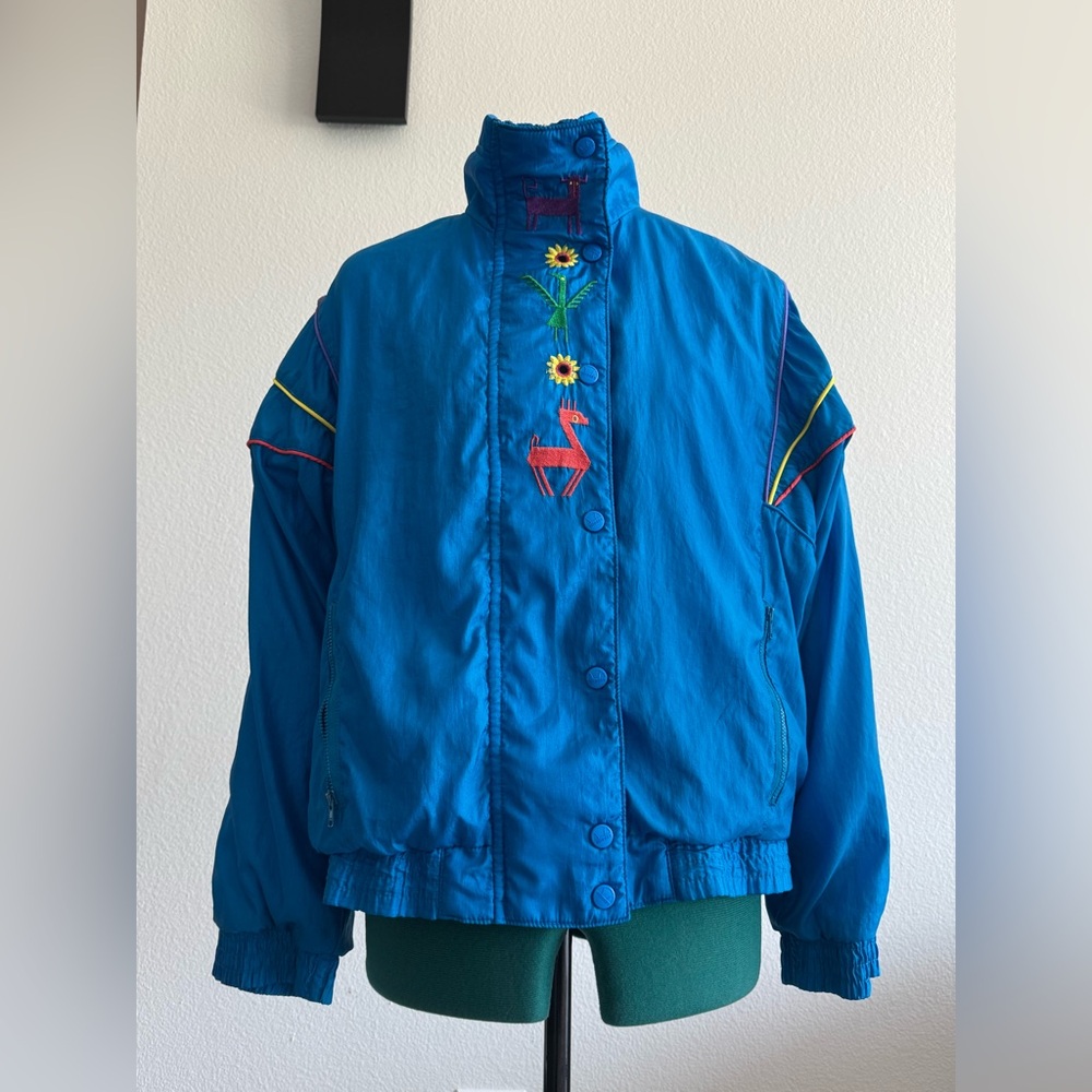 Vintage Blue Ellesse Windbreaker Jacket with Embroidered Details